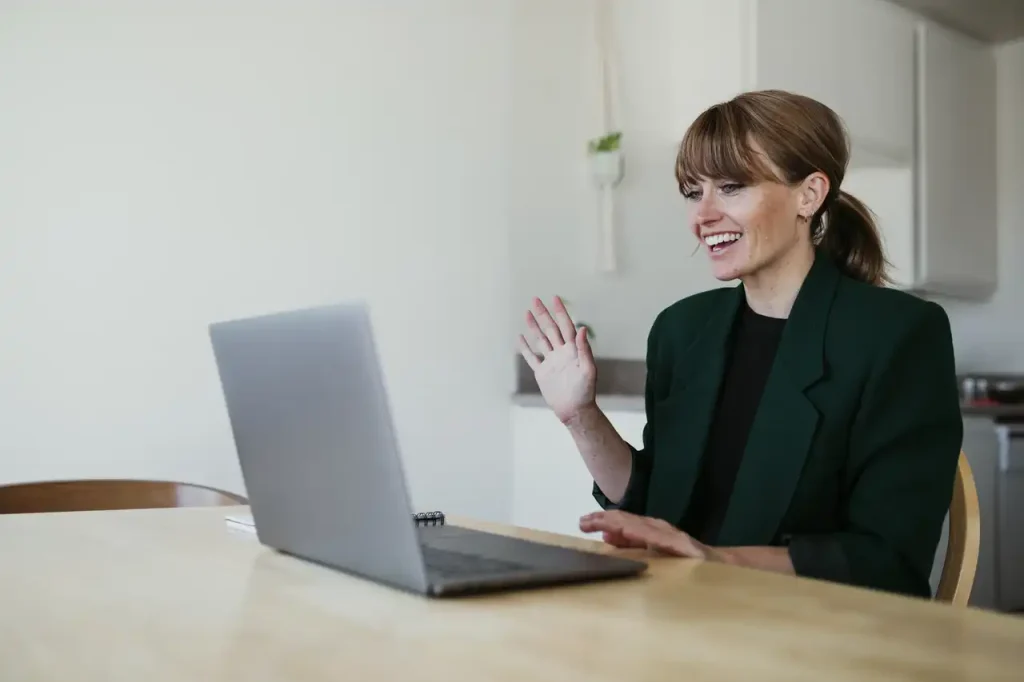 a woman making video interview at home
